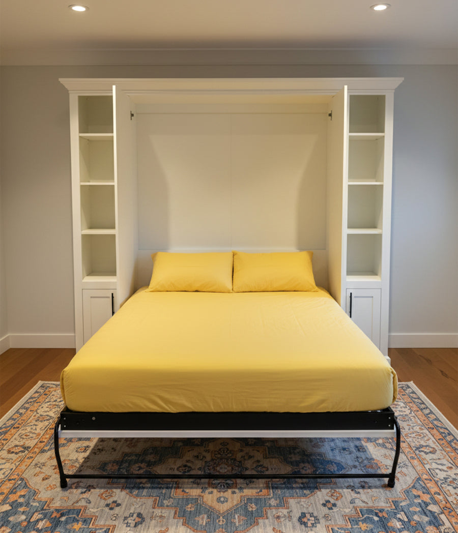 Murphy bed with yellow bedspread and white shelving space saving wall bed from Empress Collection